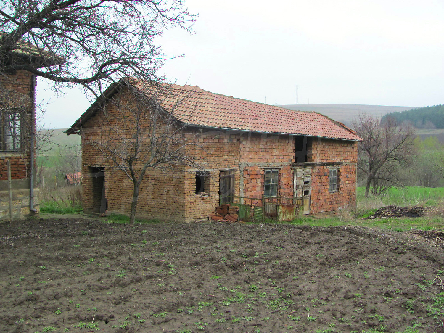 House for sale near Pleven, Bulgaria. Bargain village house with garden