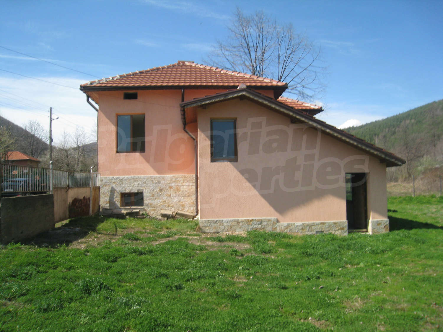 House for sale near Sofia, Bulgaria. Renovated house with garden near