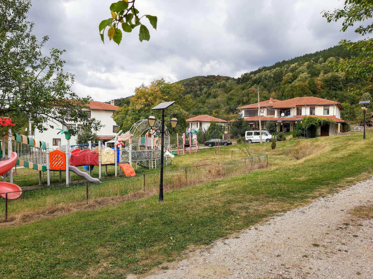Mountain holiday complex of guest houses, restaurant, swimming pools and park areas near the town of Apriltsi