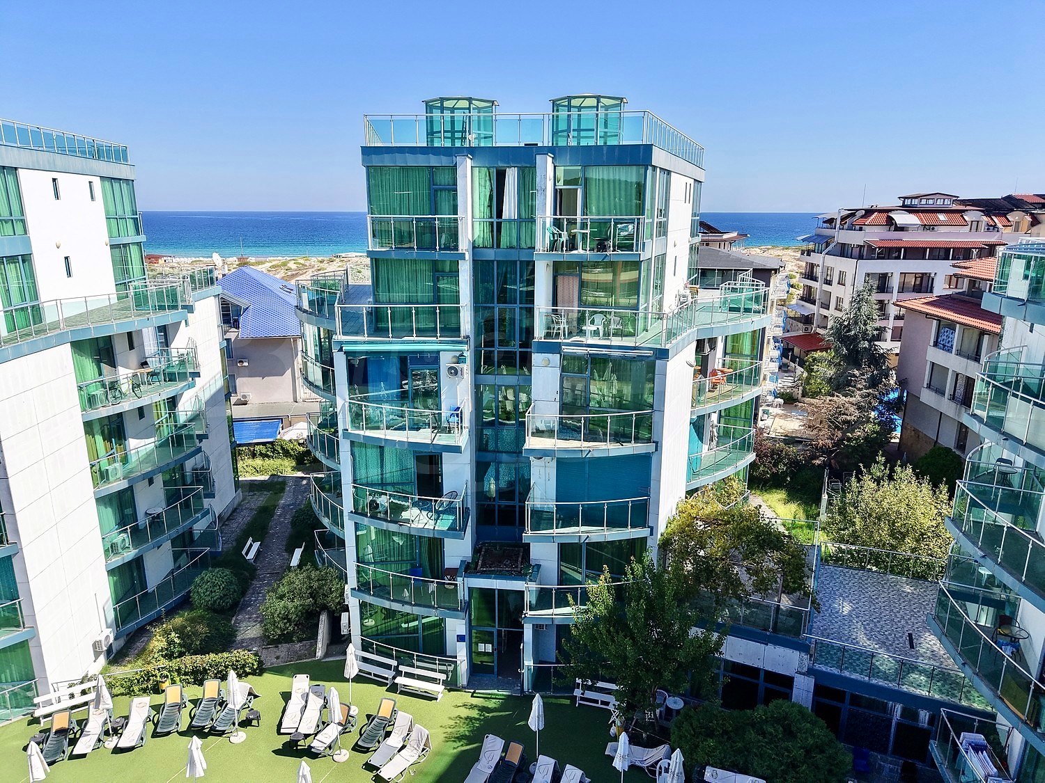 outside, facade, green area, sea