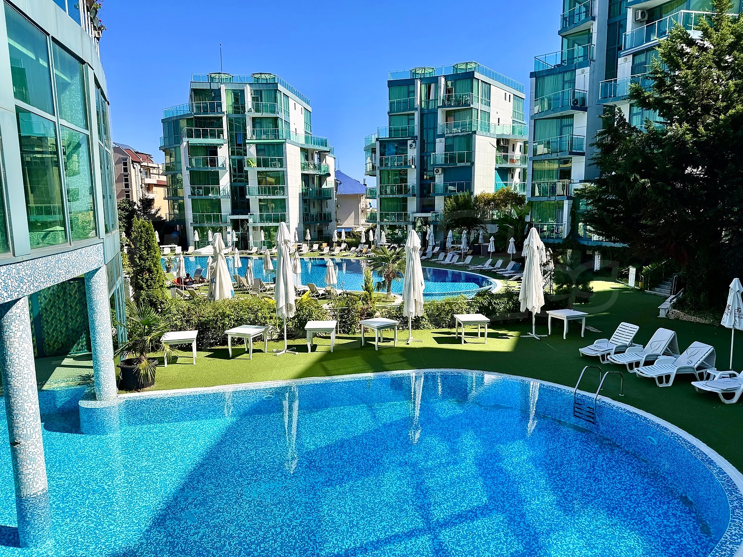 pool, outside, view from balcony, green area