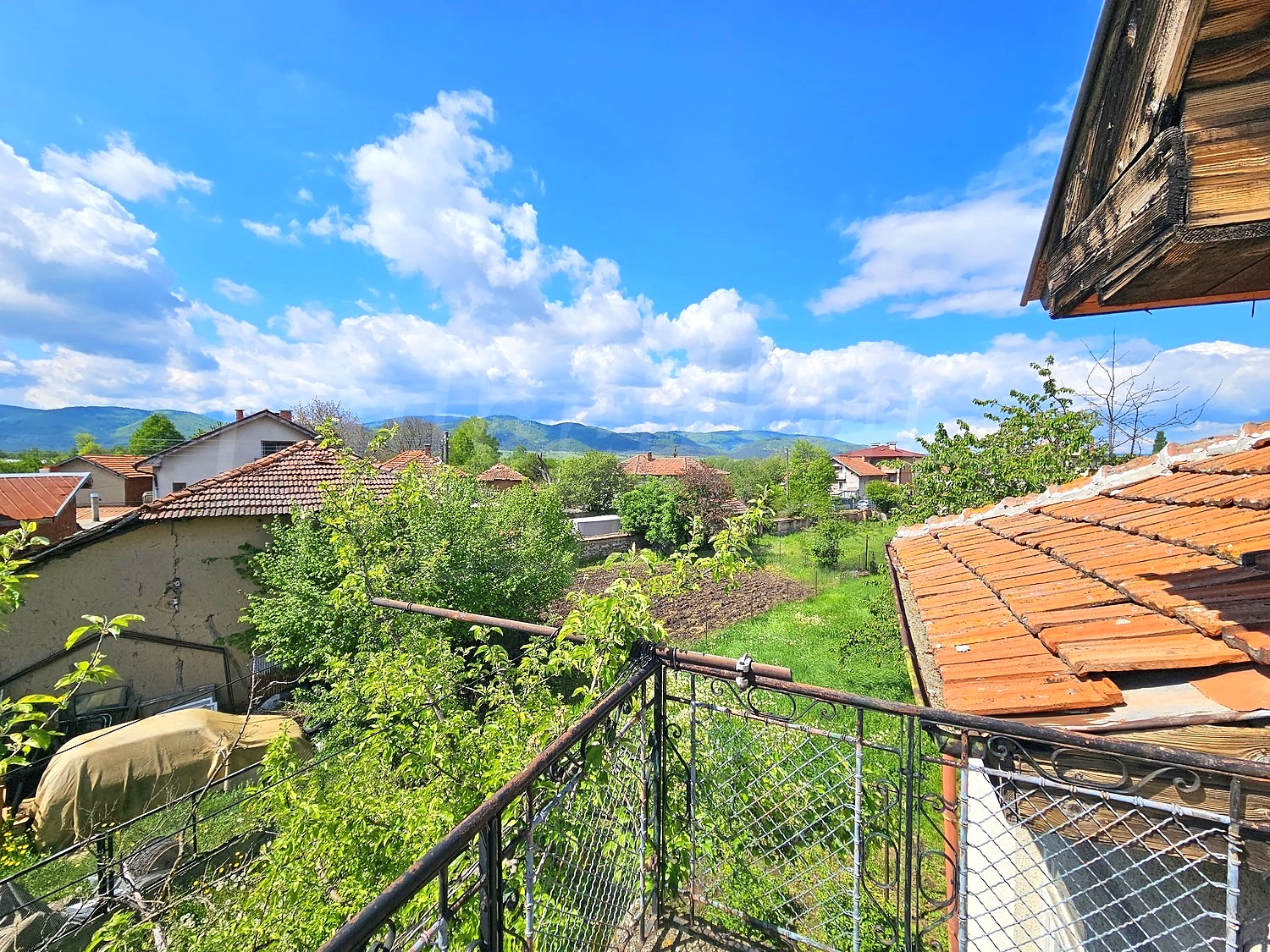 outside, view from balcony, mountain, green area