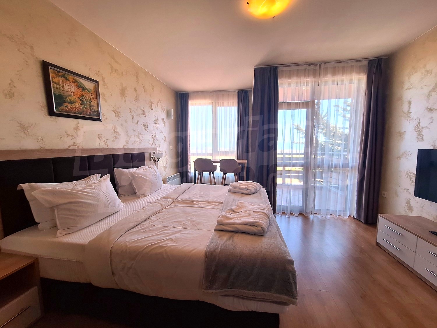 inside, bedroom, furnished, view from balcony