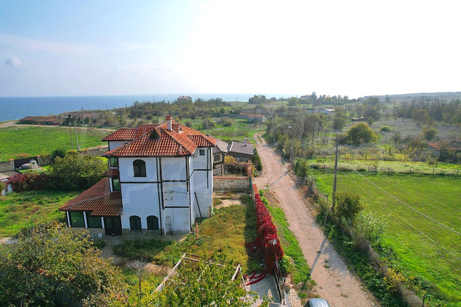 outside, facade, sea, green area