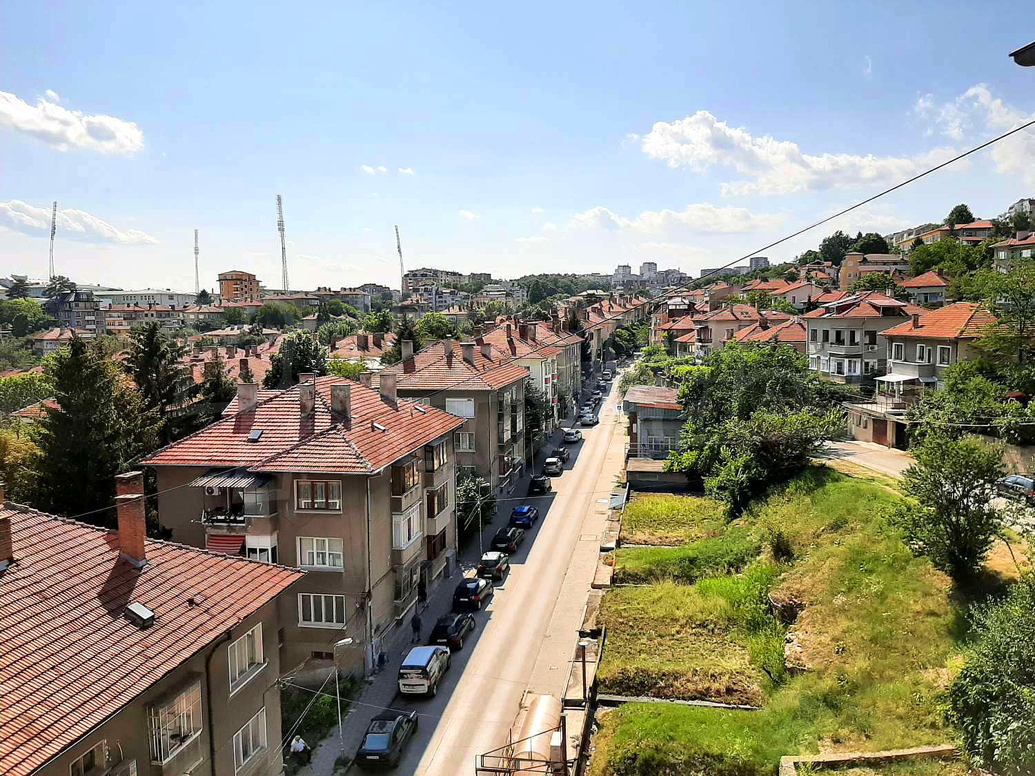 outside, view from balcony, green area