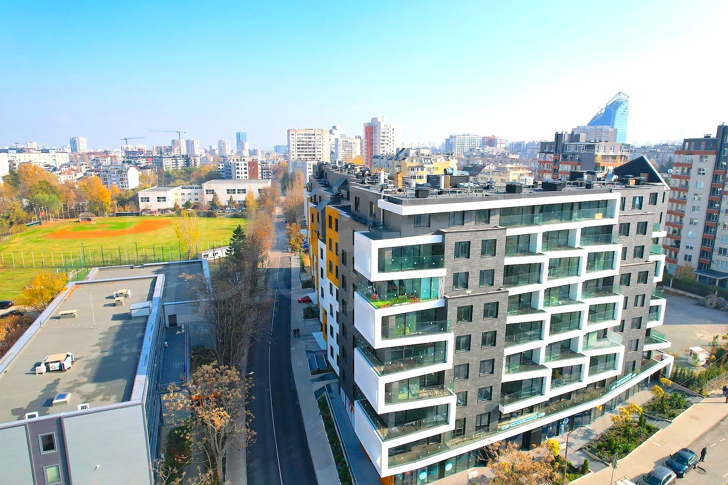 outside, facade, view from balcony, green area