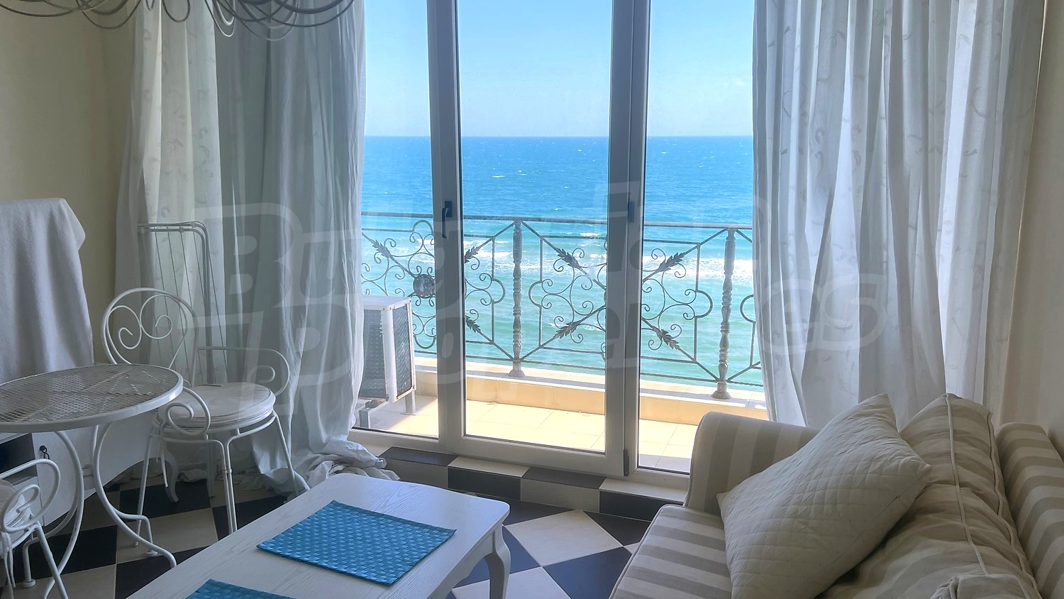 inside, living room, balcony, sea, view from balcony, furnished