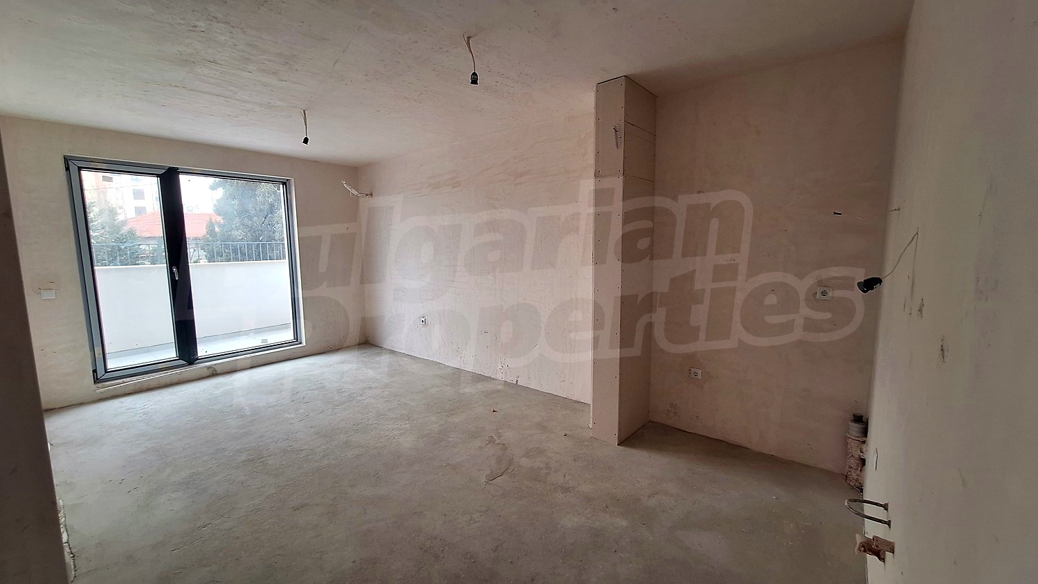 inside, unfurnished, view from balcony