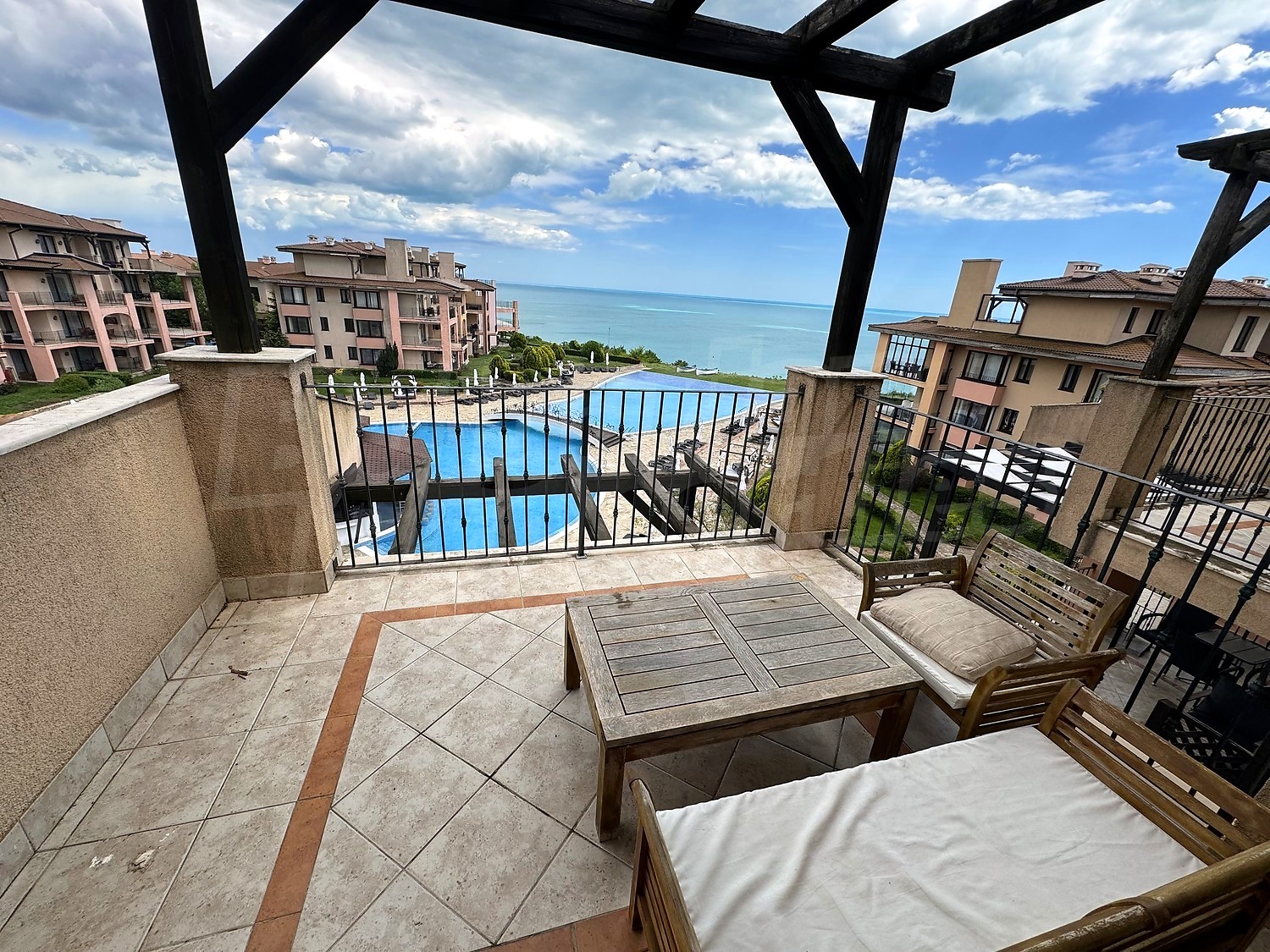 balcony, view from balcony, pool, sea