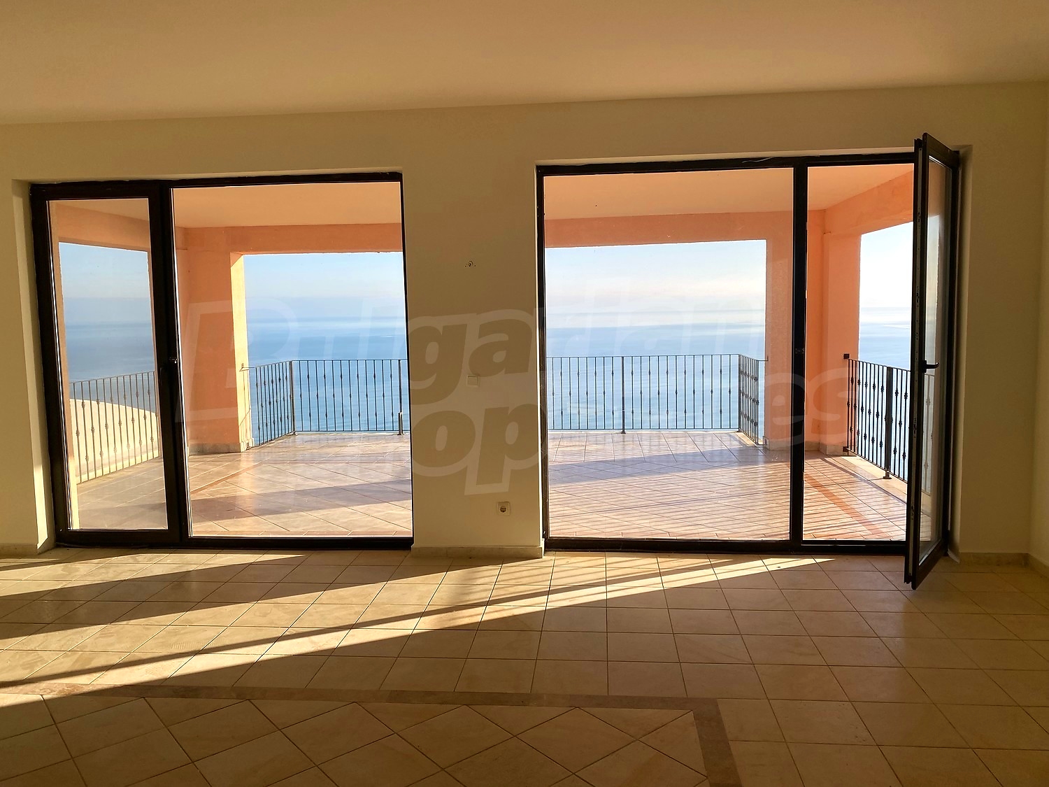 inside, balcony, view from balcony, sea