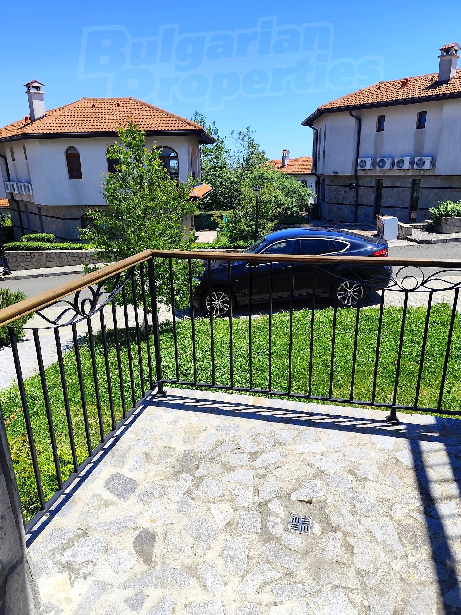 balcony, outside, parking, green area