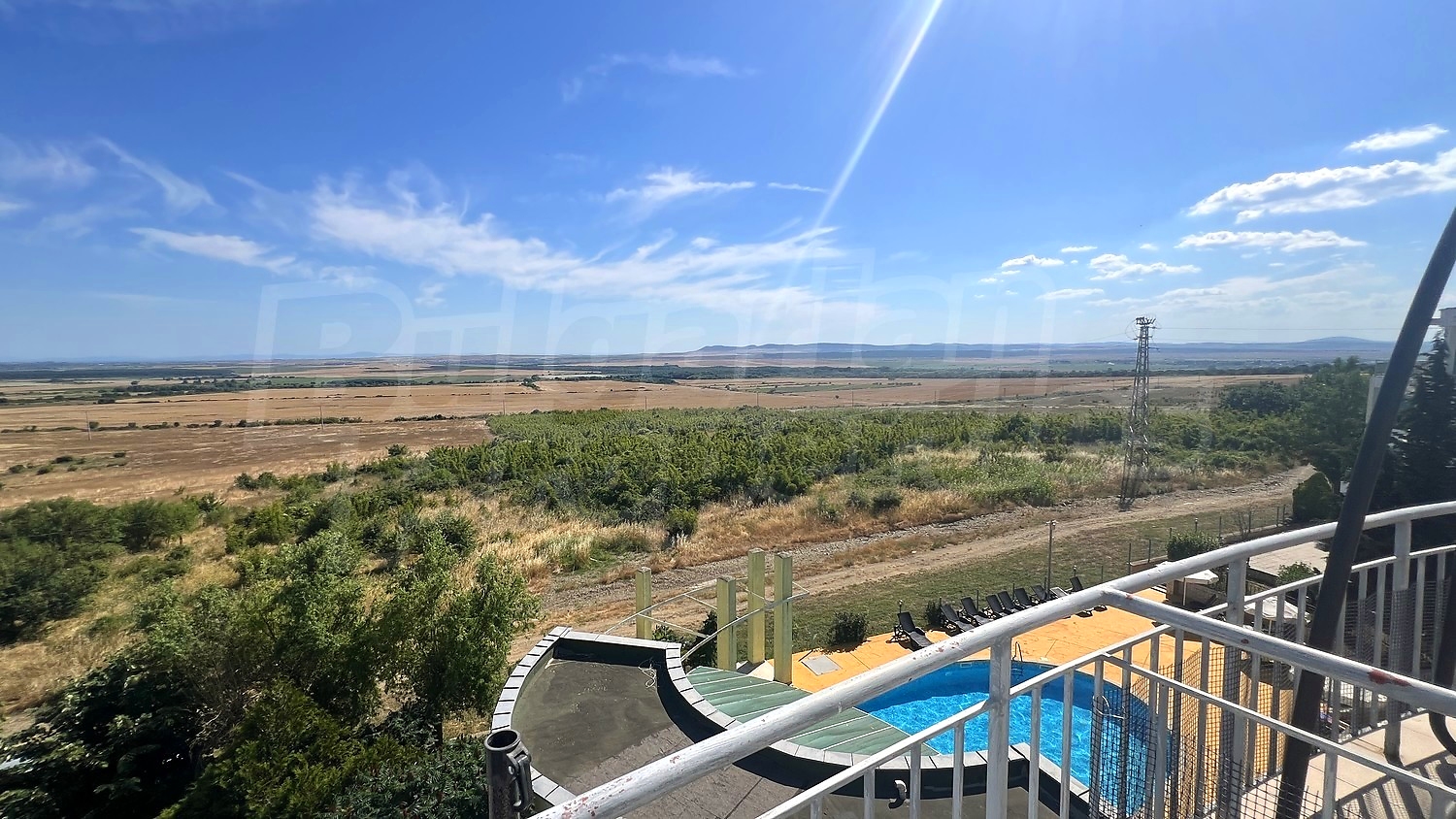 outside, view from balcony, pool, green area