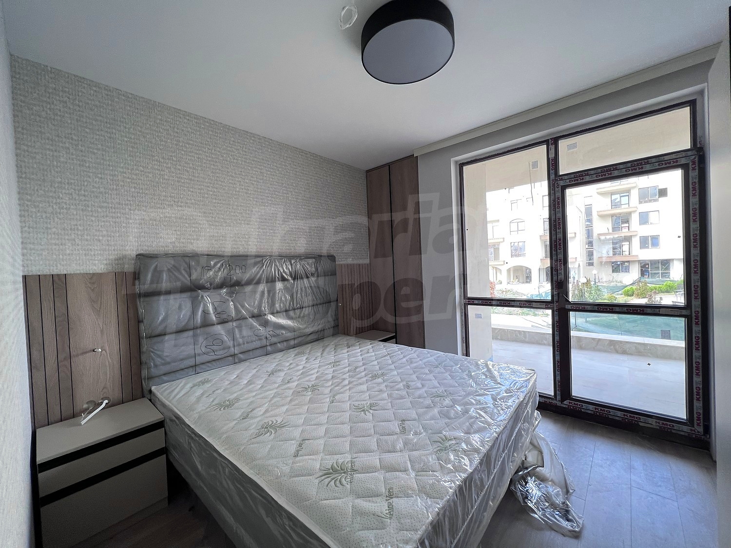inside, bedroom, view from balcony