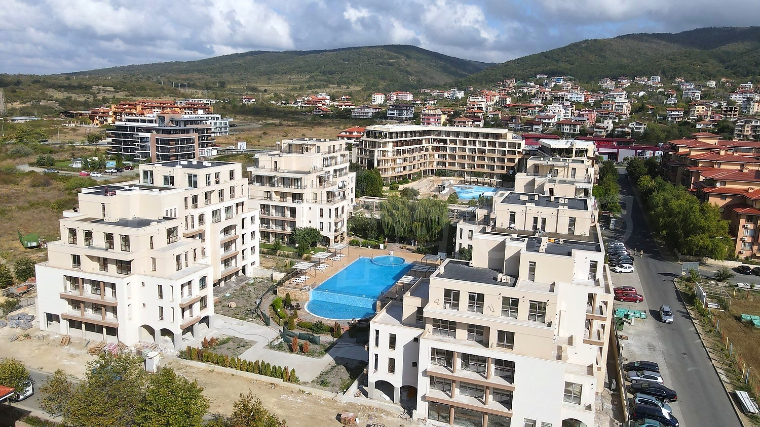 outside, facade, pool, mountain, parking