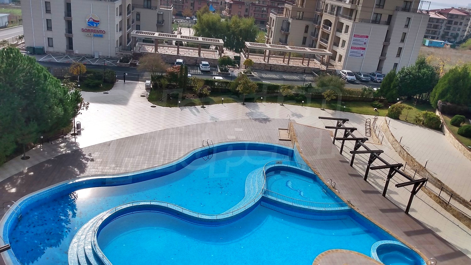 pool, outside, view from balcony, green area