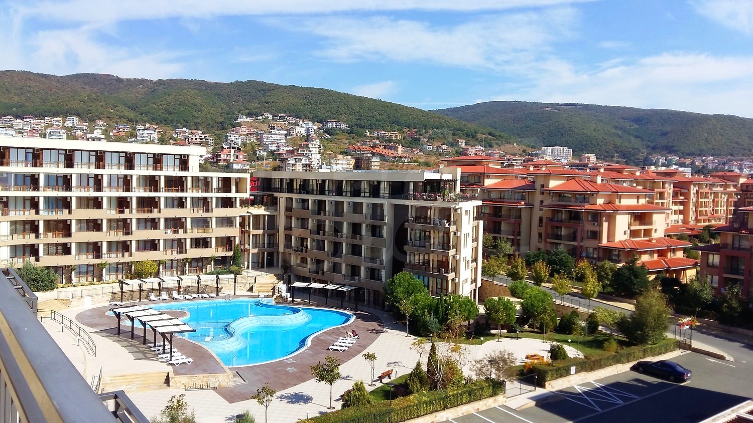 outside, pool, mountain, parking, view from balcony