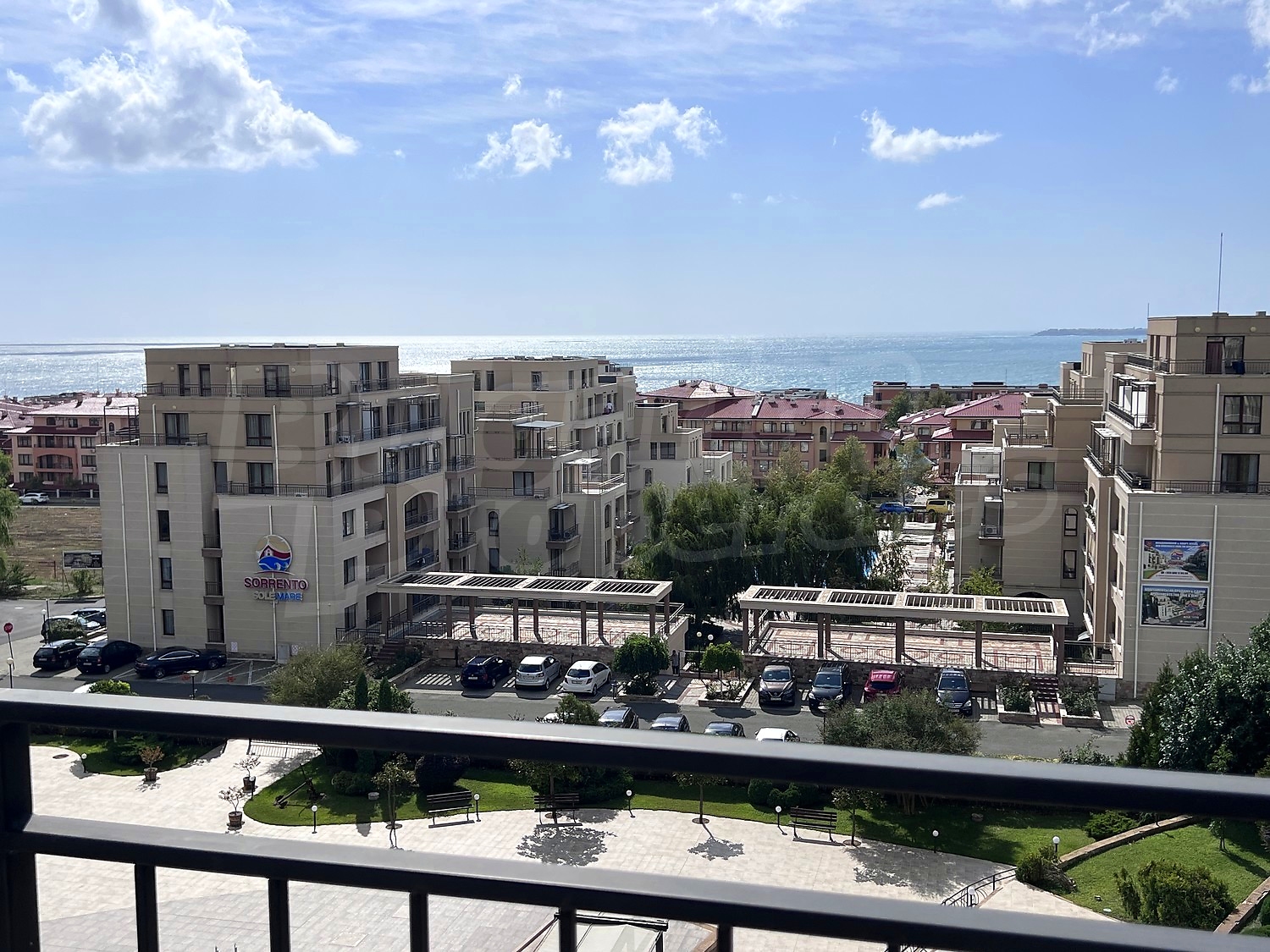 outside, view from balcony, parking, sea