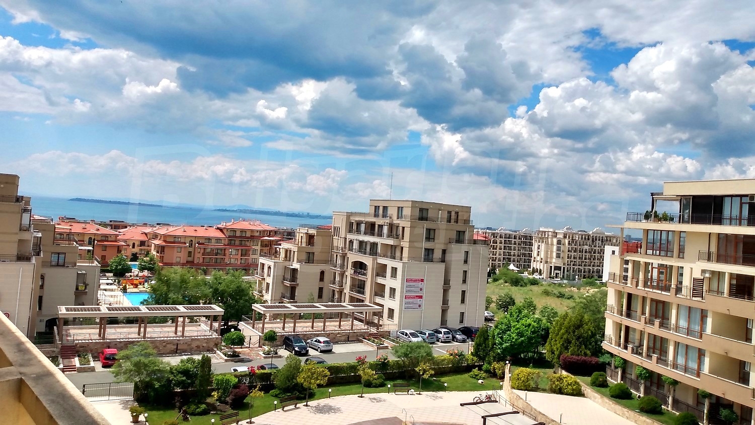 outside, view from balcony, facade, garden, parking, sea