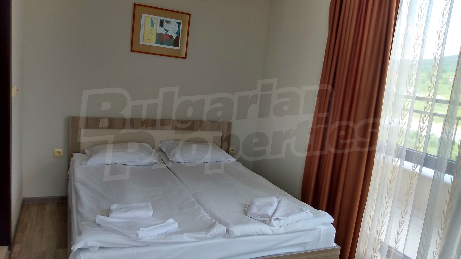 inside, bedroom, furnished, view from balcony