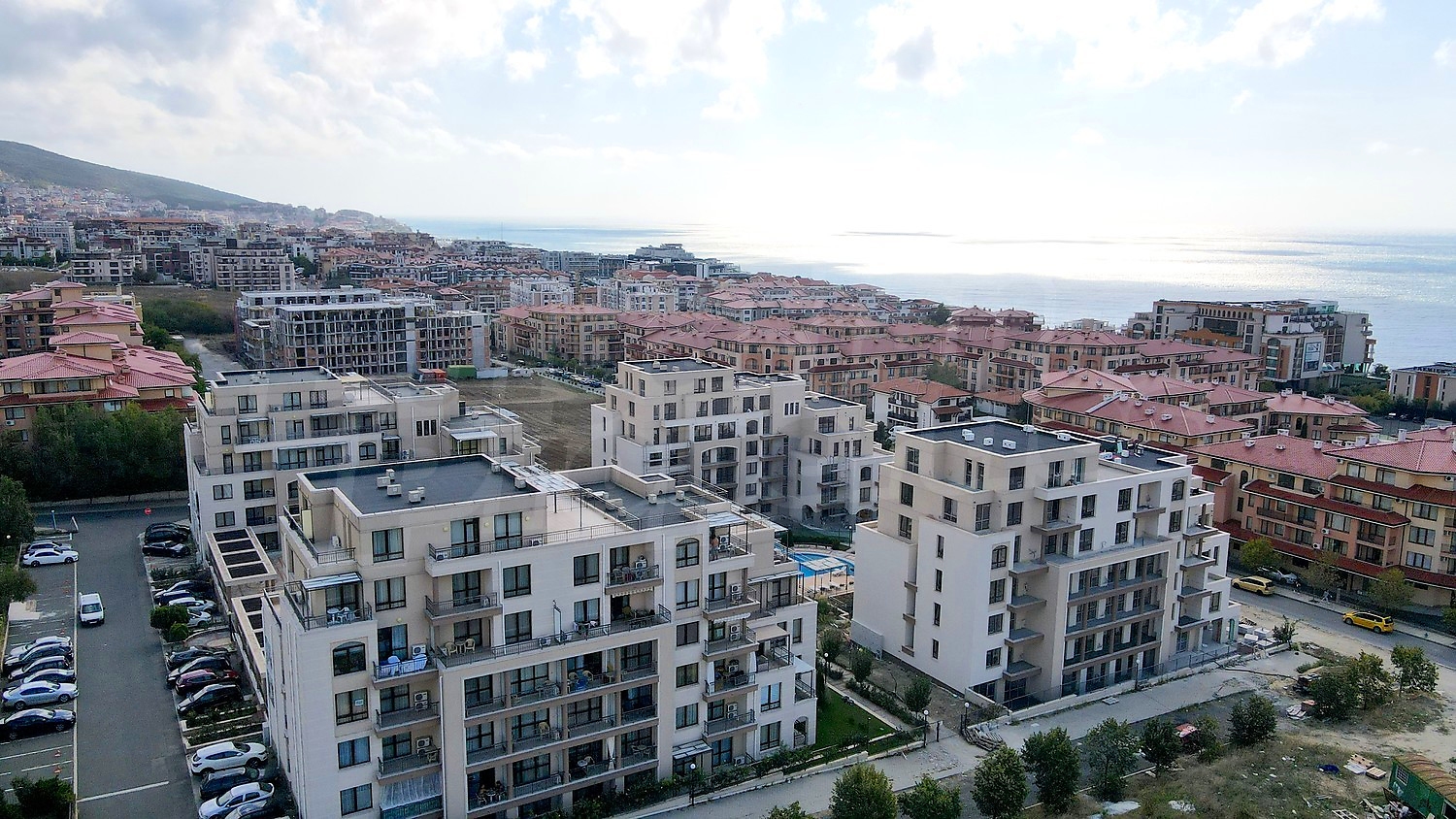 outside, view from balcony, sea, facade, parking