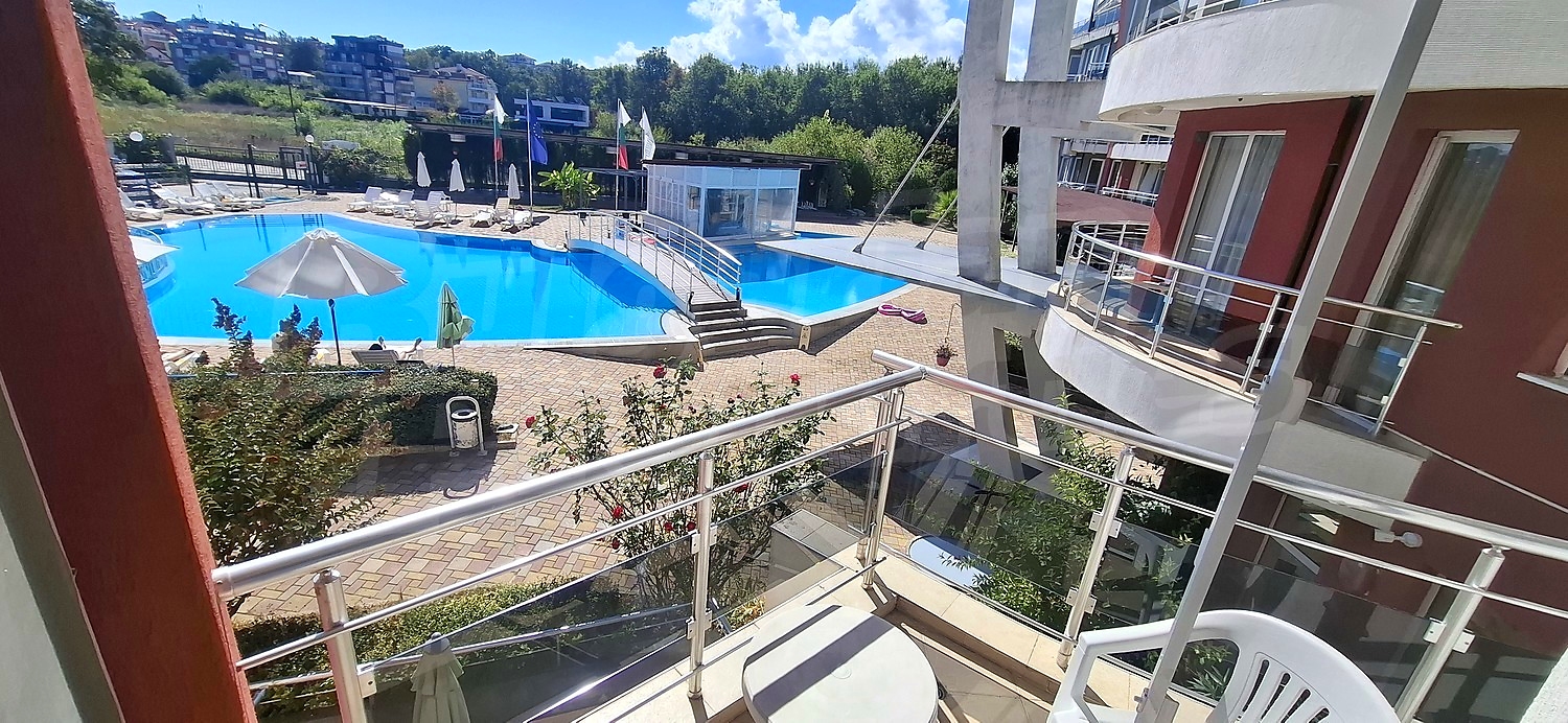 balcony, pool, outside, view from balcony, garden