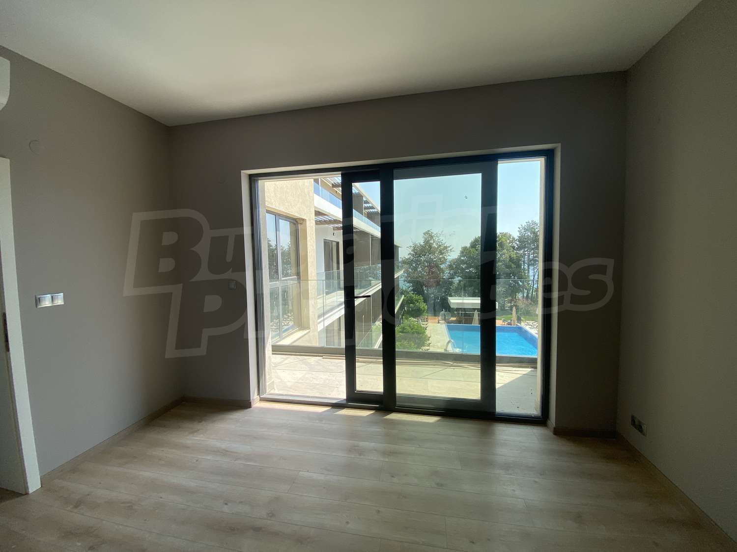 inside, view from balcony, pool