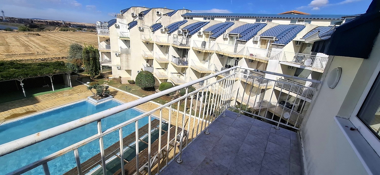 balcony, pool, outside, view from balcony