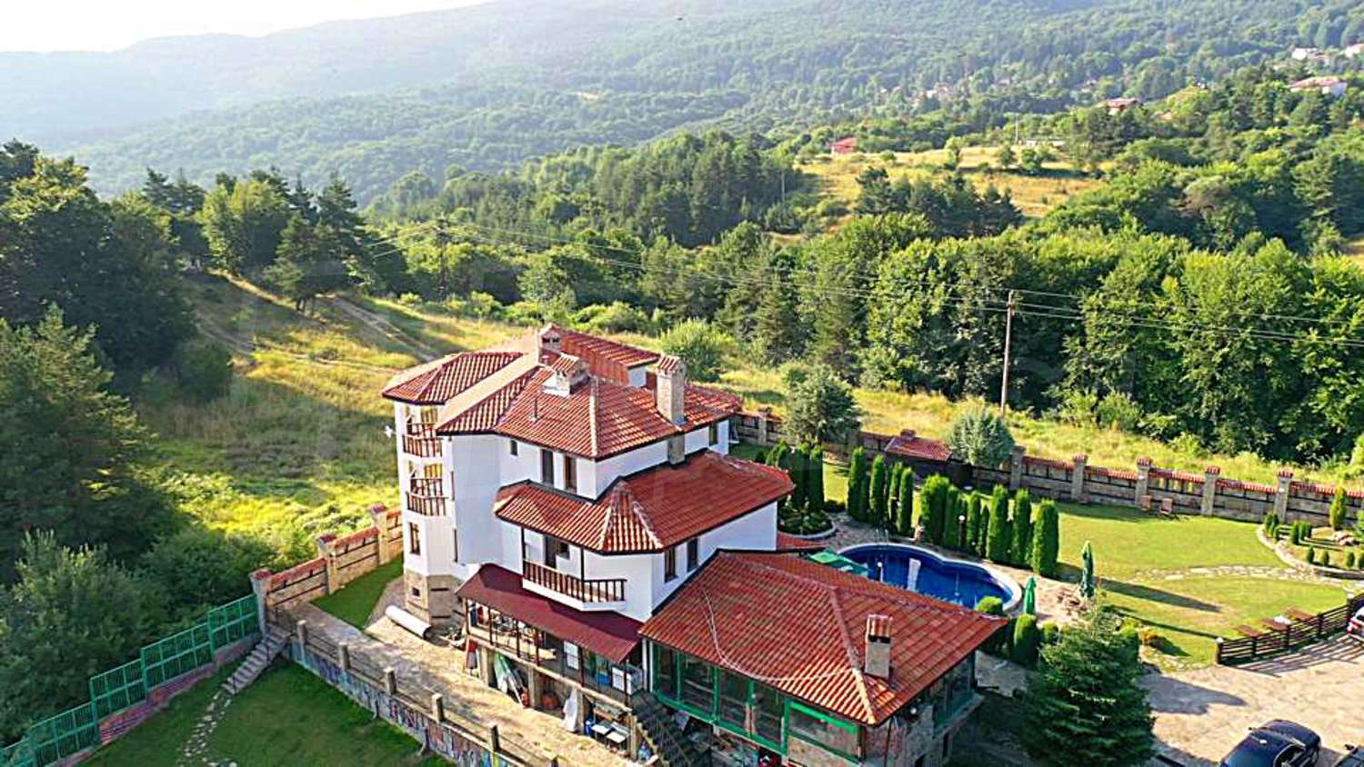 outside, mountain, green area, facade, pool, garden