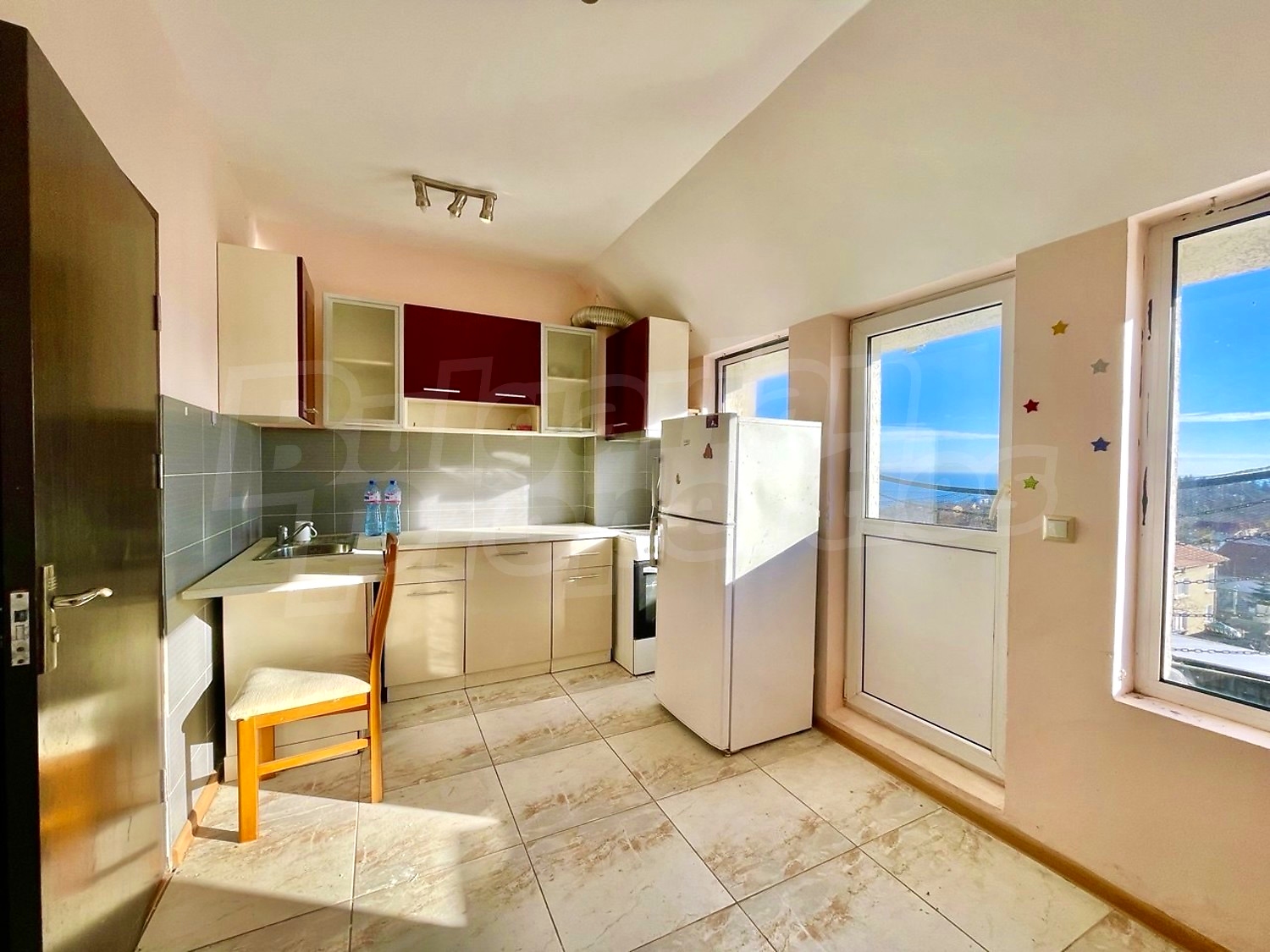 inside, kitchen, view from balcony