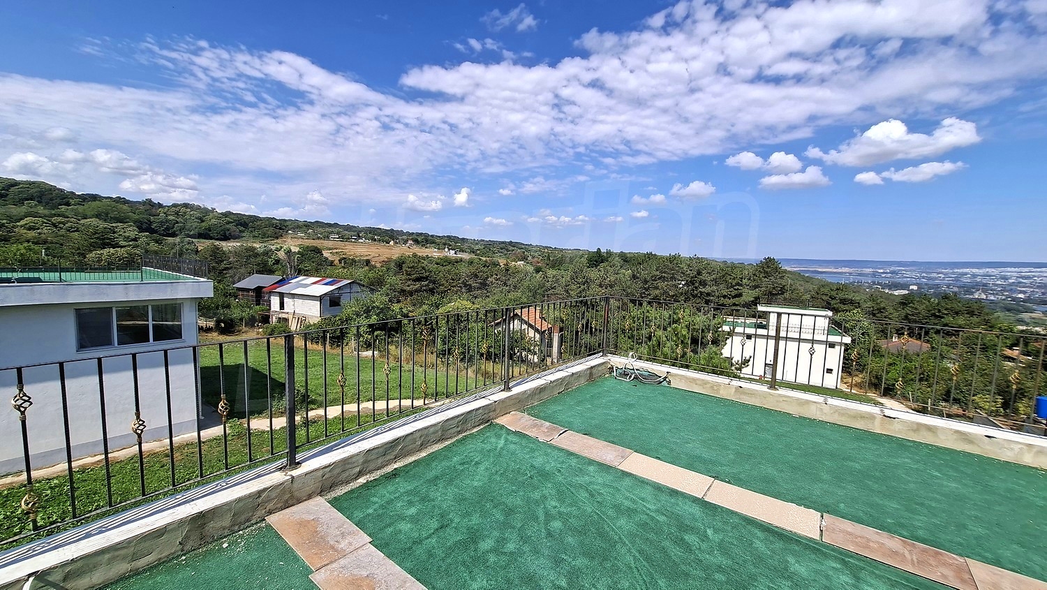 outside, view from balcony, green area