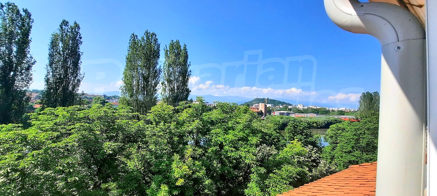 outside, view from balcony, green area