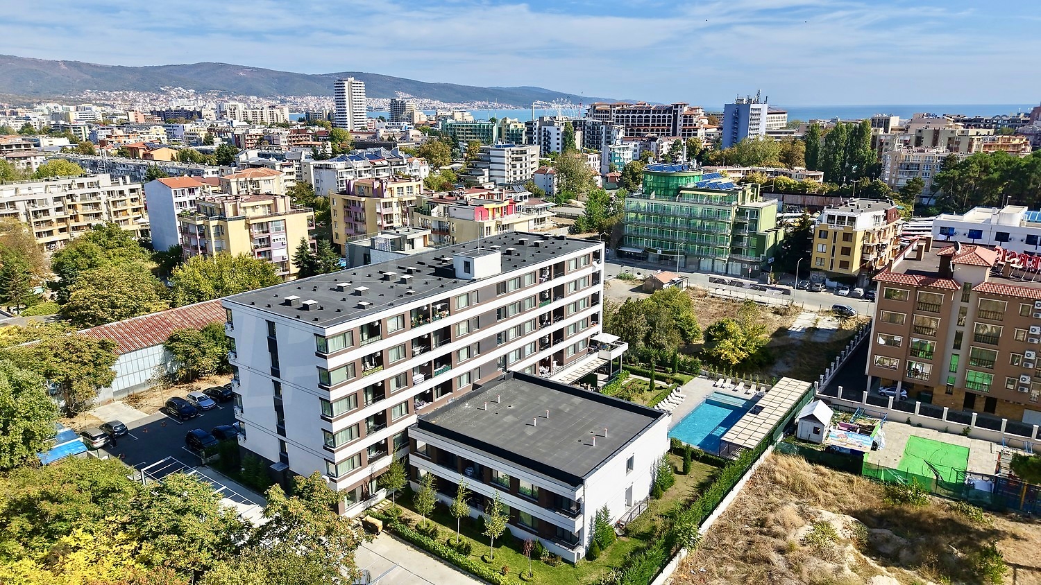 outside, facade, view from balcony, pool, parking