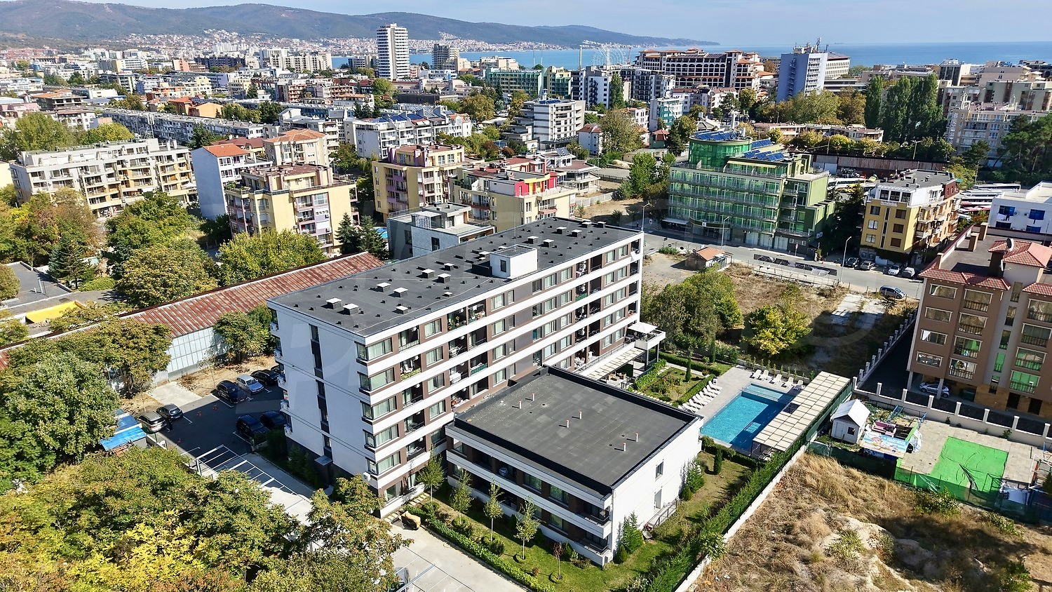 outside, facade, parking, pool, sea