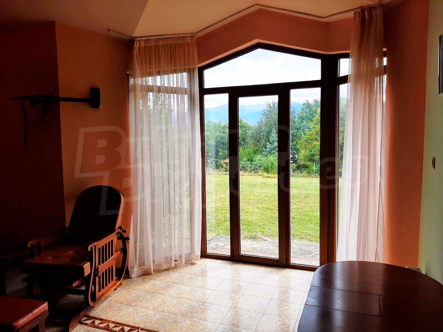 inside, living room, view from balcony, furnished, green area