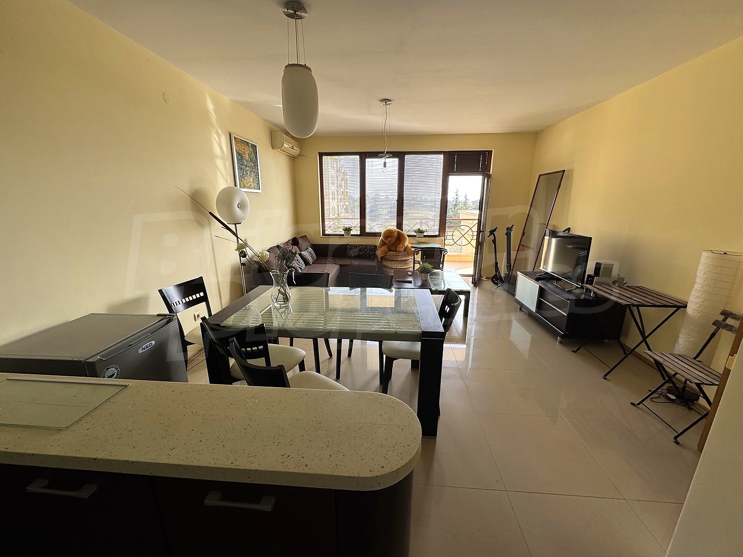 inside, living room, furnished, view from balcony