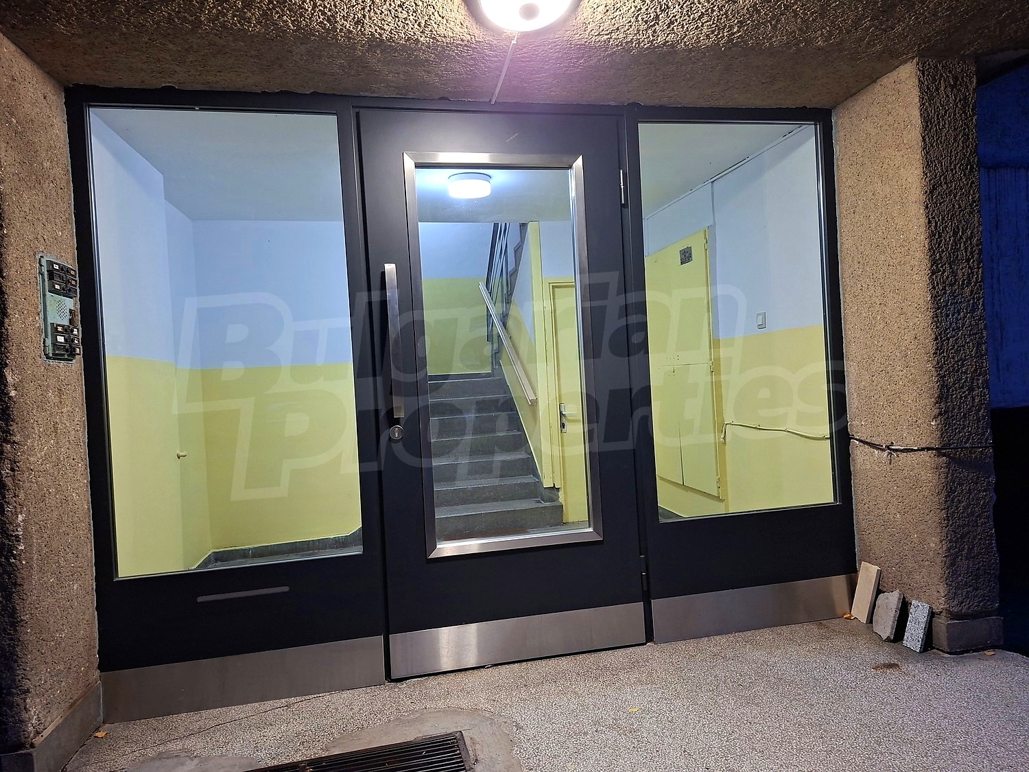 inside building entrance, stairs