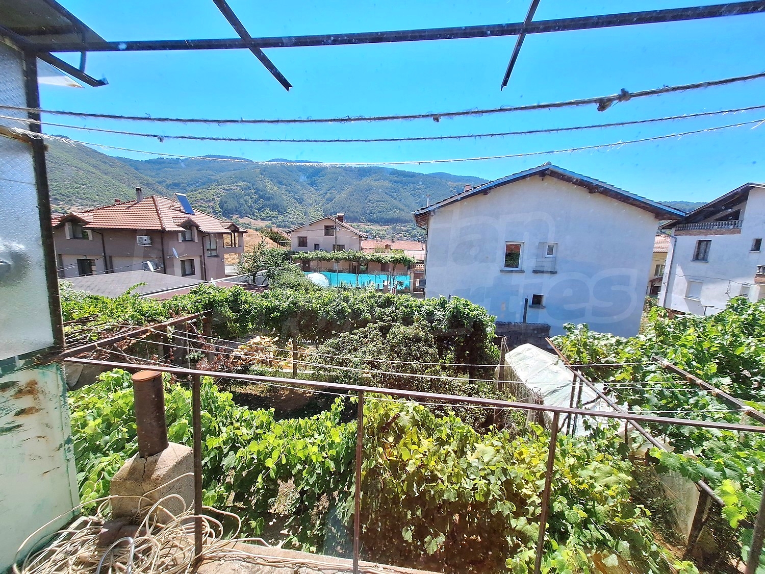 outside, view from balcony, mountain, green area