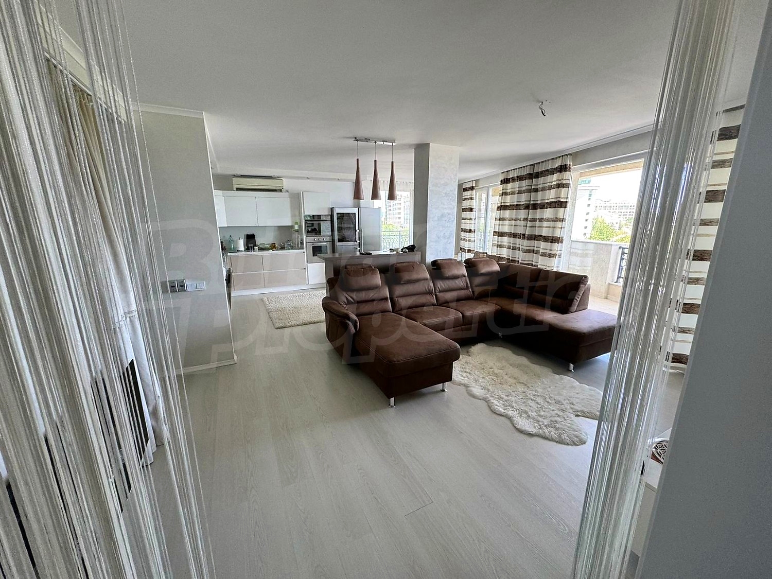inside, living room, furnished, view from balcony