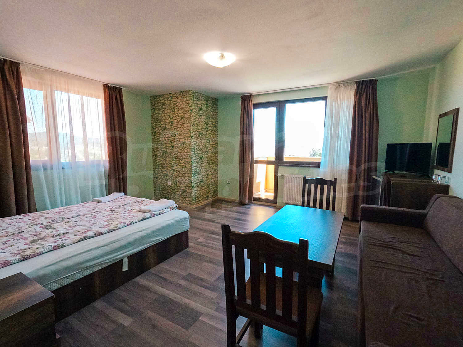 inside, bedroom, furnished, view from balcony