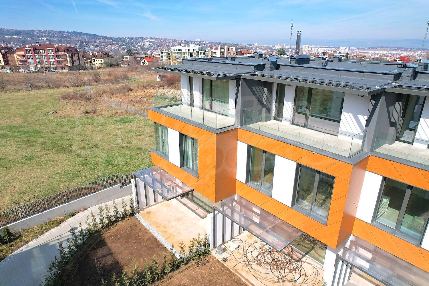 outside, facade, view from balcony, green area