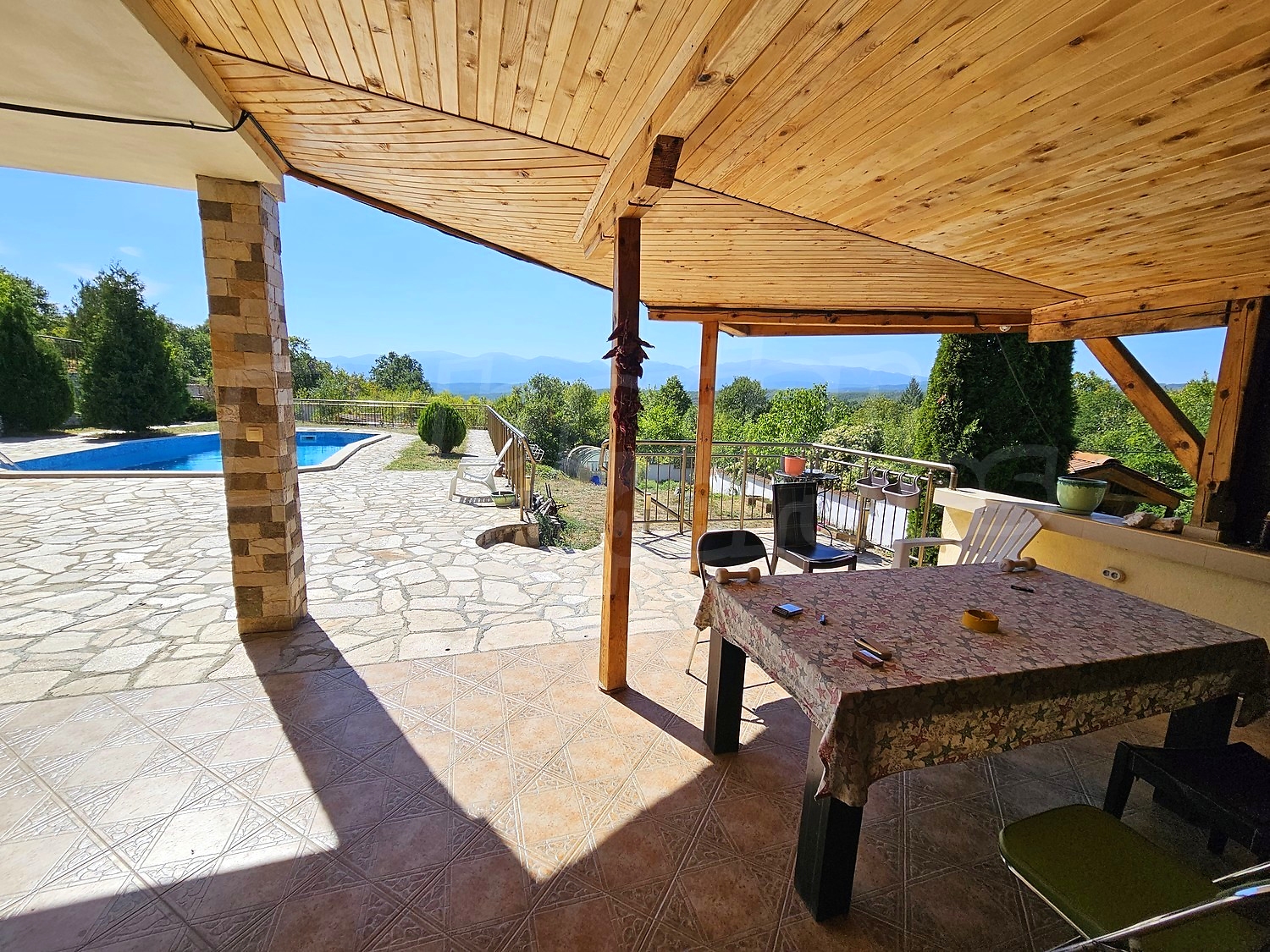 outside, view from balcony, pool, green area
