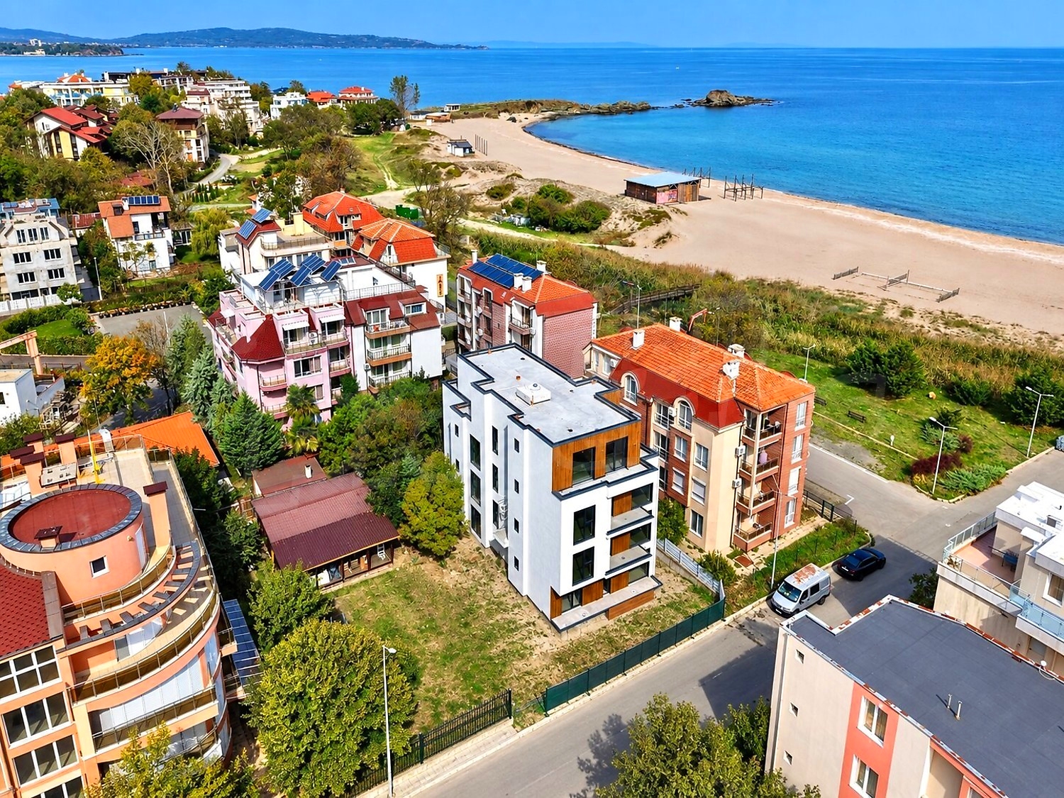 outside, facade, sea, view from balcony, green area