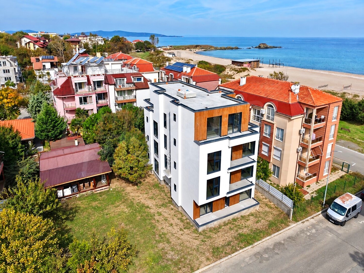 outside, facade, sea, green area