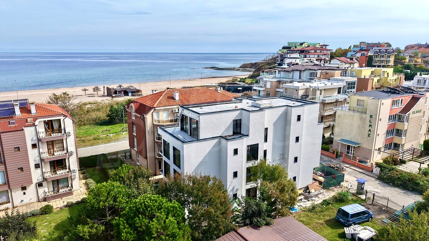 outside, sea, facade, view from balcony, parking, green area