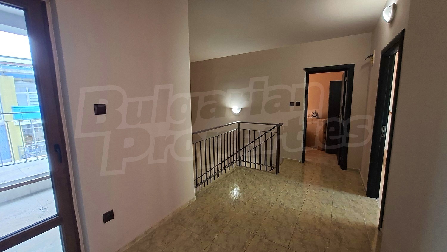 inside, hallway, view from balcony
