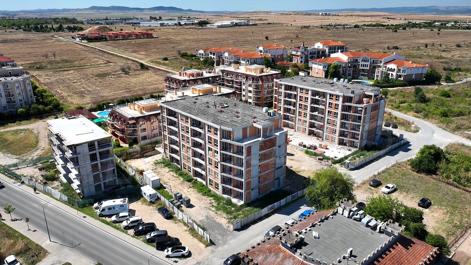 outside, facade, parking, view from balcony, mountain