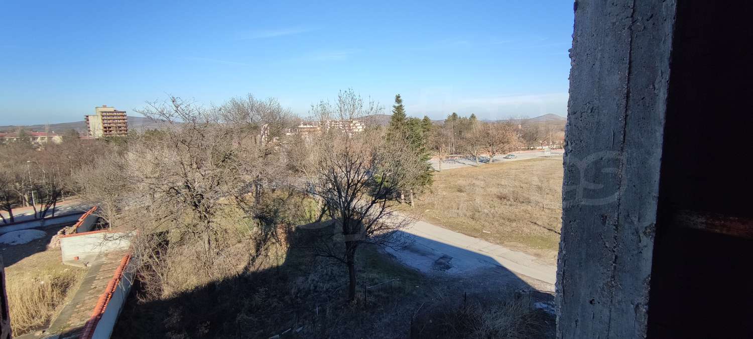 outside, view from balcony, green area