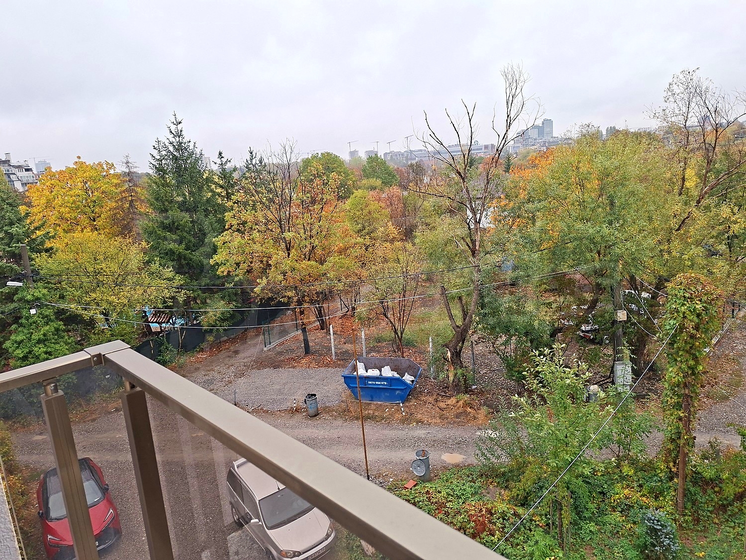 balcony, outside, view from balcony, parking, garden