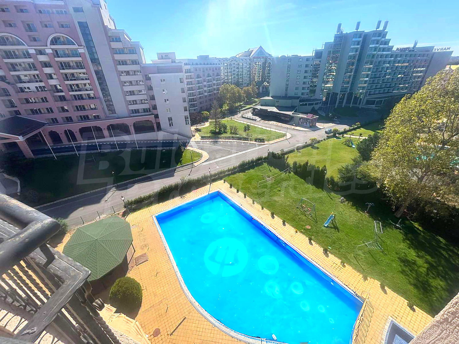 outside, view from balcony, pool, garden