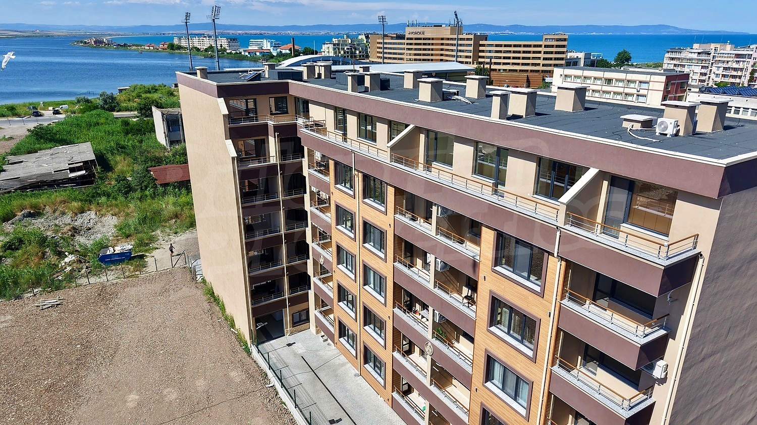outside, facade, view from balcony, sea